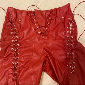 Red faux leather pants
